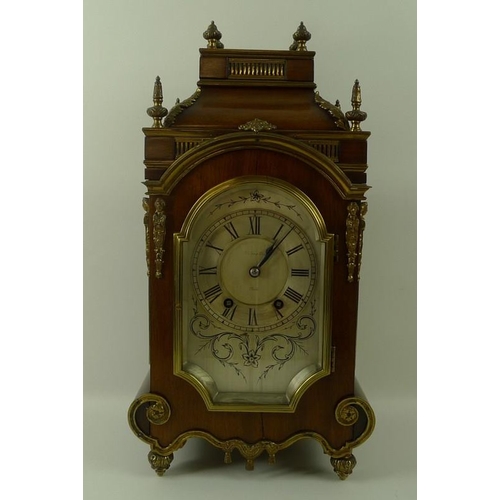 651 - A Victorian mahogany cased mantel clock, silvered dial with black Roman numerals, twin train WBK & F... 