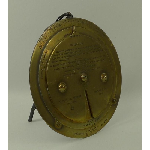 654 - A Negretti & Zambra brass forecaster barometer, early 20th century, with engraved scale and instruct... 