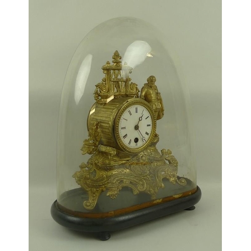 655 - A French gilt spelter figural mantel clock modelled as Shakespeare in his library, standing on a ope... 