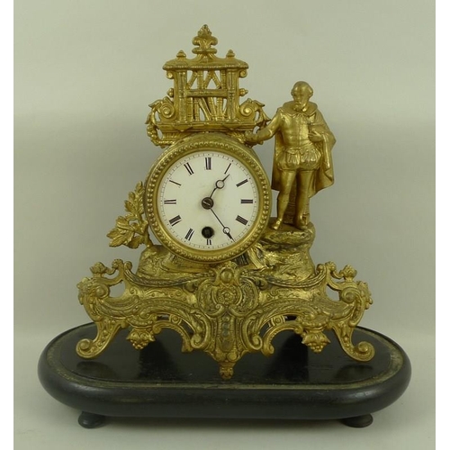 655 - A French gilt spelter figural mantel clock modelled as Shakespeare in his library, standing on a ope... 