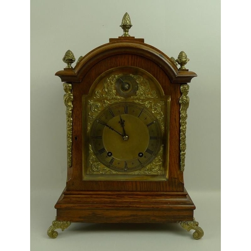 656 - An oak cased mantel clock, 19th century, W&H and Sons, of architectural form, the domed top above br... 