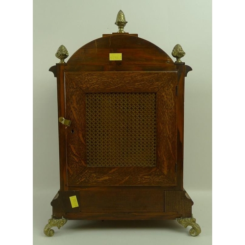 656 - An oak cased mantel clock, 19th century, W&H and Sons, of architectural form, the domed top above br... 