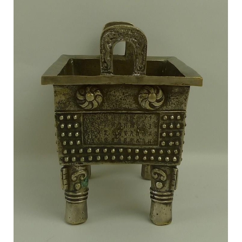 660A - A Chinese censer, Fang Ding style, silvered bronze of rectangular slab form, cast with twin loop han... 