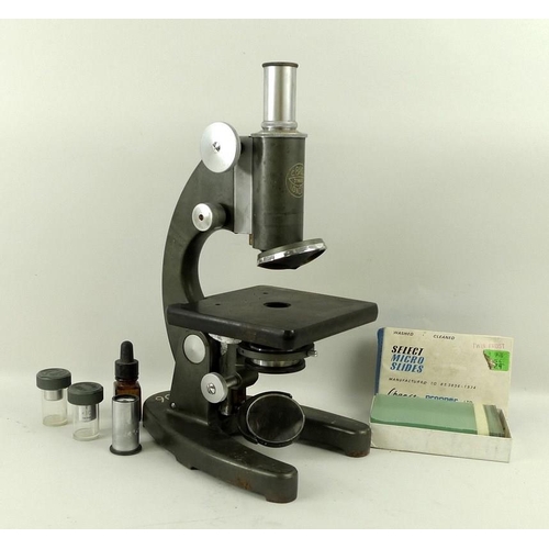 661 - A microscope, C Baker, number 39665, with J Swift and Son lend, W204, a Baker lens, x10, and slides,... 