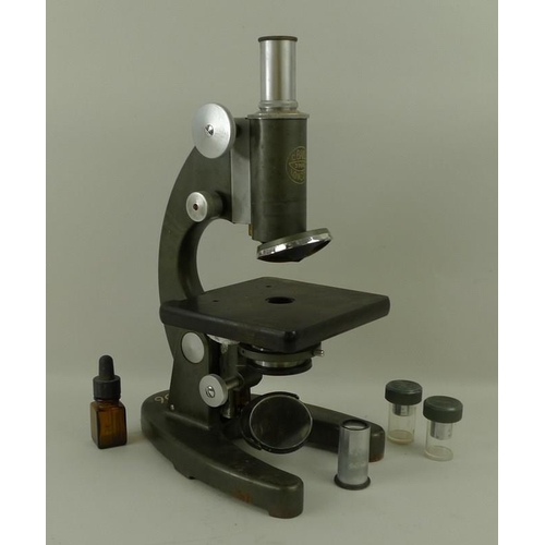 661 - A microscope, C Baker, number 39665, with J Swift and Son lend, W204, a Baker lens, x10, and slides,... 