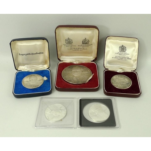 679 - A group of five silver commemorative Winston Churchill medallions, comprising two Spink and Son Ltd ... 