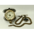 A Voyager travel clock, by Grants of Dalvey, cased, and a plated Albert chain with T bar and hard st... 