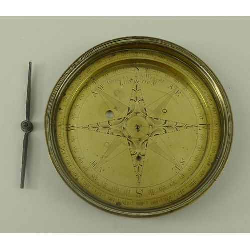 705 - A brass compass, 18th century, Gregory and Wright, London, engraved with floral motifs, 13cm diamete... 