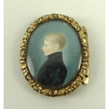 A miniature of a young boy in a blue velvet jacket, floral yellow metal mount, and plaited hari vers... 