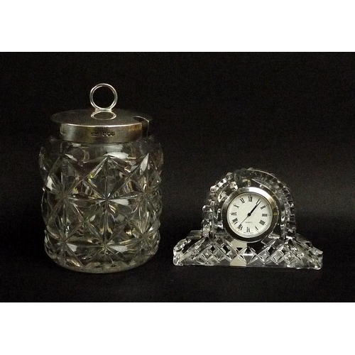 710A - A Waterford Crystal clock, 10 by 4 by 7cm, and a cut glass jam pot, with silver lid, Sheffield 1918,... 