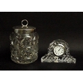 A Waterford Crystal clock, 10 by 4 by 7cm, and a cut glass jam pot, with silver lid, Sheffield 1918,... 