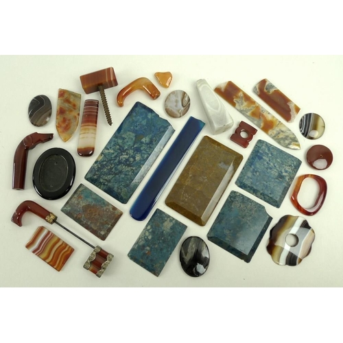 715A - A collection of agate and stone pieces, comprising an agate greyhound head, evening bag fittings, po... 