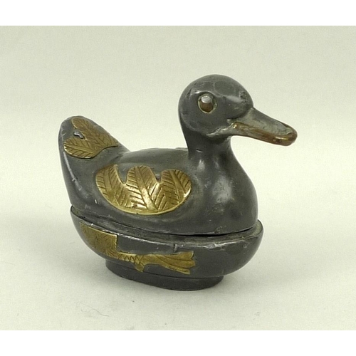 716 - A pewter and yellow metal pill box with lid, in the form of a duck, stamped A and S inside the lid, ... 