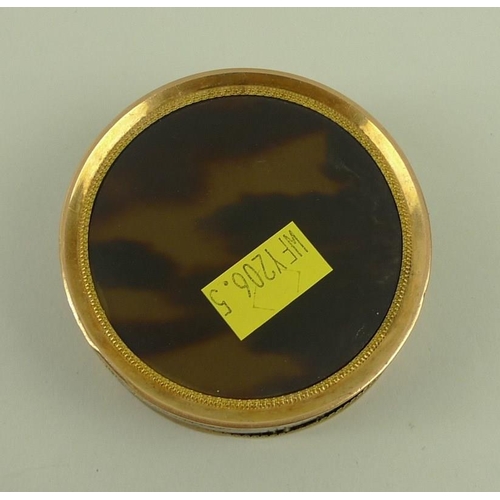 717 - A faux tortoiseshell pill box, with painted lid, the circular miniature of a Georgian lady holding a... 