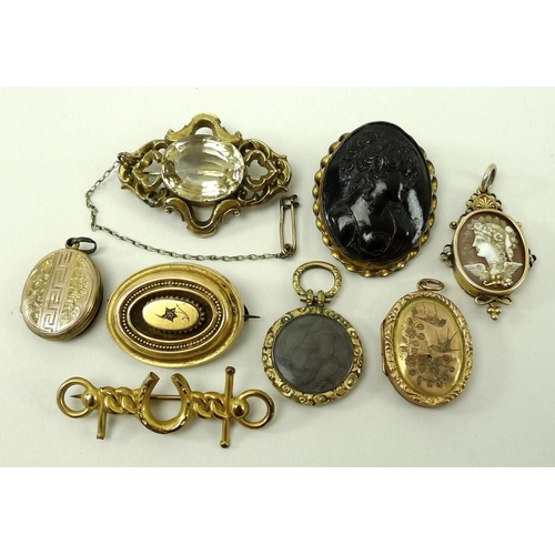 719 - A collection of Victorian and later gold, yellow metal and silver brooches and pendants, comprising ... 