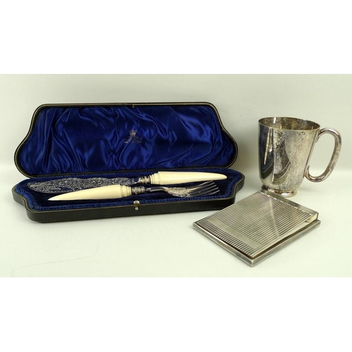 726 - An ivory and plated fish knife and fork, engraved, boxed, a plated flip lid notepad, and a tankard. ... 