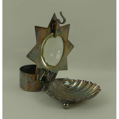 727 - A Hukin & Heath silver plated watch stand with magnifier and integral shell dish, 15 by 10 by 13cm.