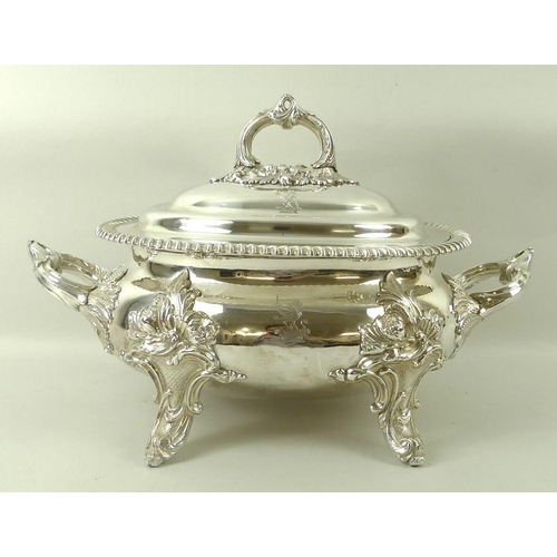 732 - A Regency silver plated tureen and cover, of oval form with twin foliate cast handles, gadrooned rim... 