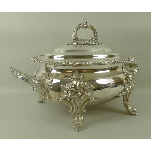 732 - A Regency silver plated tureen and cover, of oval form with twin foliate cast handles, gadrooned rim... 