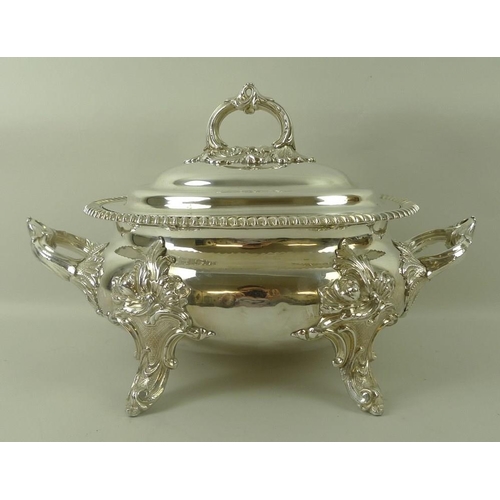 732 - A Regency silver plated tureen and cover, of oval form with twin foliate cast handles, gadrooned rim... 