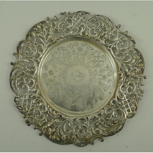 741 - A set of silver plated on copper plates or dishes, early to mid 20th century, with pierced rim appli... 