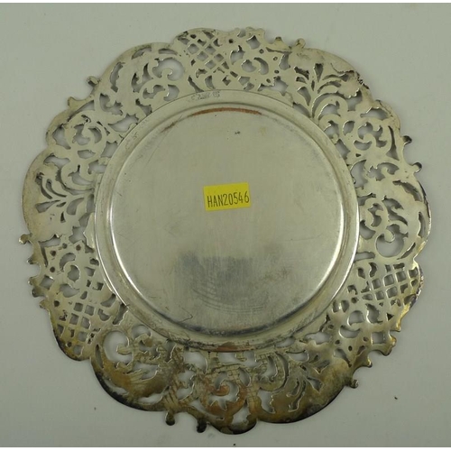 741 - A set of silver plated on copper plates or dishes, early to mid 20th century, with pierced rim appli... 