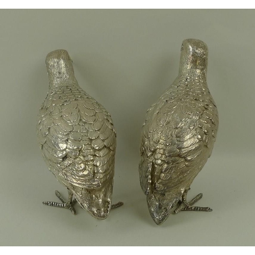 744 - A pair of silver partridges, London 1968, 16toz, 12cm.