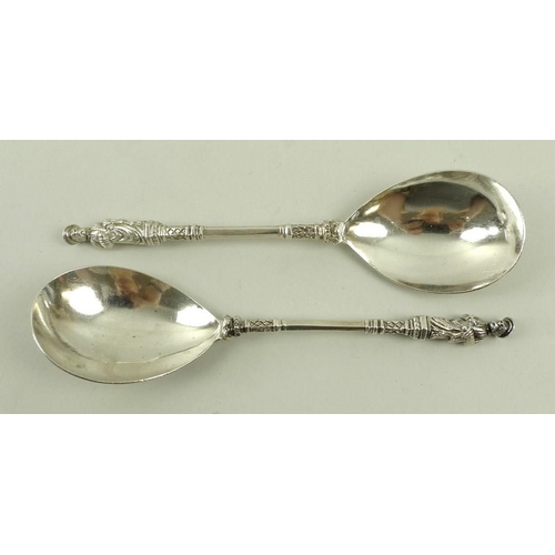 752 - A pair of silver apostle dessert spoons, London 1881, marked CSH for Charles Stuart Harris, 17.5cm l... 