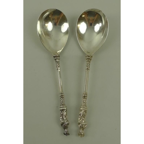 752 - A pair of silver apostle dessert spoons, London 1881, marked CSH for Charles Stuart Harris, 17.5cm l... 