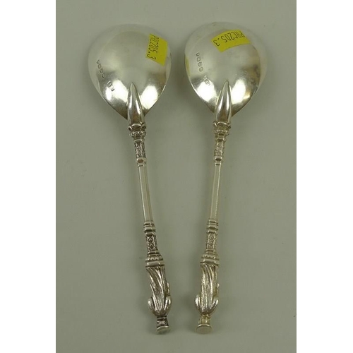 752 - A pair of silver apostle dessert spoons, London 1881, marked CSH for Charles Stuart Harris, 17.5cm l... 