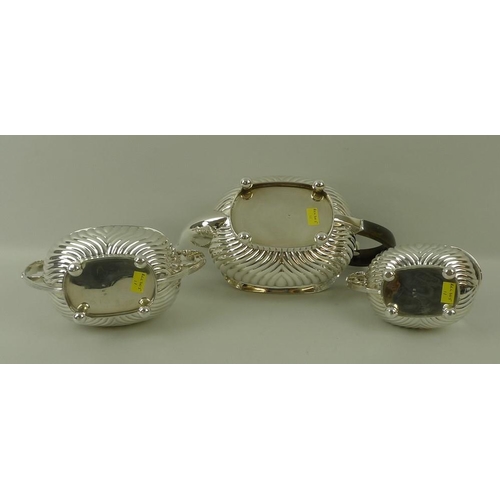 757 - A Victorian silver three piece tea set, London shape with reeded bodies, reeded and leaf scroll hand... 