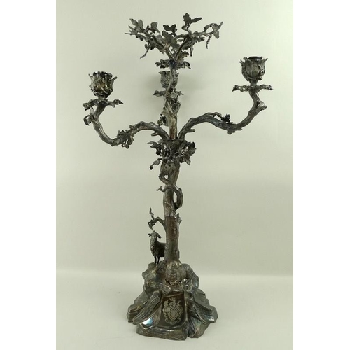 758 - A Victorian silver plated three branch candelabra, Elkington & Co, circa 1860, cast with a sheep and... 