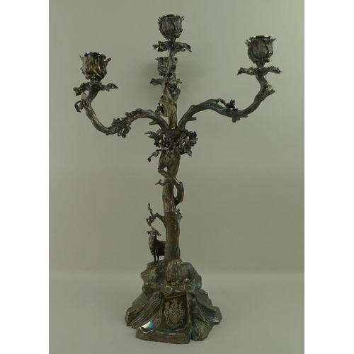 758 - A Victorian silver plated three branch candelabra, Elkington & Co, circa 1860, cast with a sheep and... 