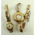 A lady's 18ct gold half hunter wristwatch, with Arabic numerals, numbered 242372, on expanding brace... 