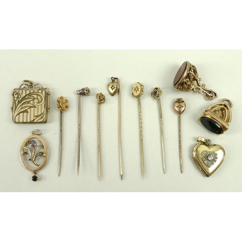 825 - A group of seven stick pins and further jewellery, including a diamond stick pin, the central diamon... 