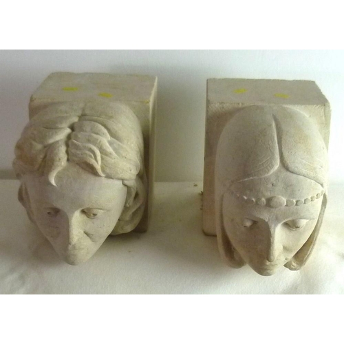 851 - Two Ancaster stone, carved corbels, each depicting a female head, circa 1970, 15 by 18 by 30cm. (2)