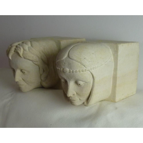 851 - Two Ancaster stone, carved corbels, each depicting a female head, circa 1970, 15 by 18 by 30cm. (2)