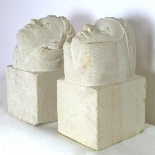 851 - Two Ancaster stone, carved corbels, each depicting a female head, circa 1970, 15 by 18 by 30cm. (2)