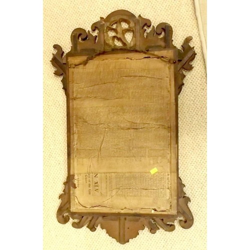 911A - A Georgian mahogany fretwork wall mirror, with gilt ho ho bird surmount, rectangular plate and gilt ... 