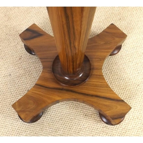 913 - A William IV rosewood chess pedestal table, the fold out top supported on an octagonal tapered colum... 