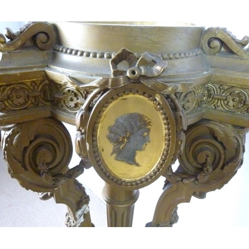 916 - A pair of Victorian jardiniere stands, the tops with painted portrait plaques, raised on a central c... 