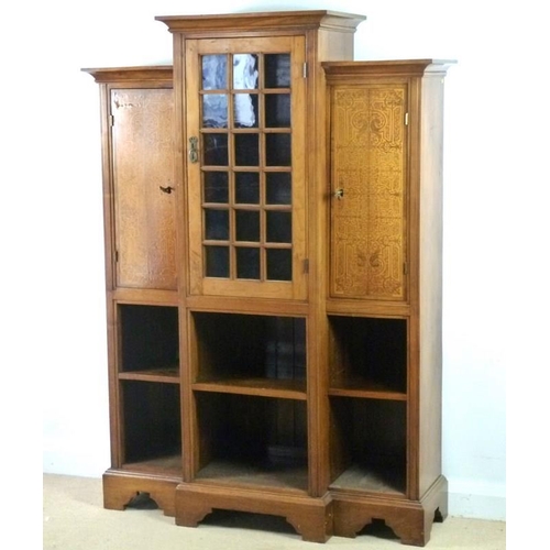 917 - An Aesthetic Movement walnut and satinwood seaweed marquetry inlaid breakfront display cabinet, the ... 