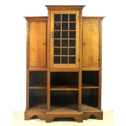 917 - An Aesthetic Movement walnut and satinwood seaweed marquetry inlaid breakfront display cabinet, the ... 