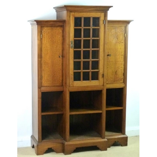 917 - An Aesthetic Movement walnut and satinwood seaweed marquetry inlaid breakfront display cabinet, the ... 