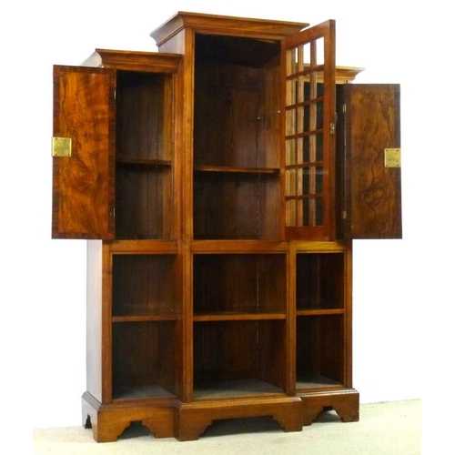 917 - An Aesthetic Movement walnut and satinwood seaweed marquetry inlaid breakfront display cabinet, the ... 