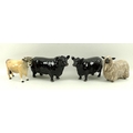 A group of Beswick farm ruminants comprising pair of black Aberdeen Angus cattle, both bull, and cow... 