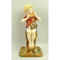 A Royal Worcester figurine of Peter Pan, number 3011, with a red shirt, modelled by F. Gertner, 20cm... 