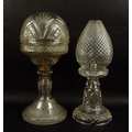 A cut glass table lamp of torch shape, 31cm, and another similar with round shade, 3cm, both on flar... 