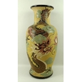 A Chinese baluster vase, decorated with enamel five toed dragon on cream ground with incised decorat... 
