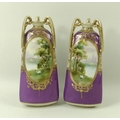 A pair of Noritake vases, of triangular form with three Art Nouveau style handles, purple ground wit... 